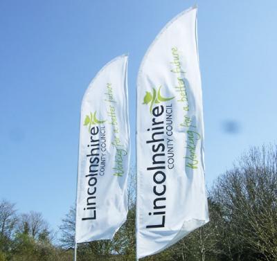 Why choose promotional flags over traditional banners?